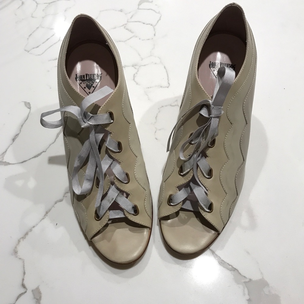 John Fluevog women’s lace up pumps.